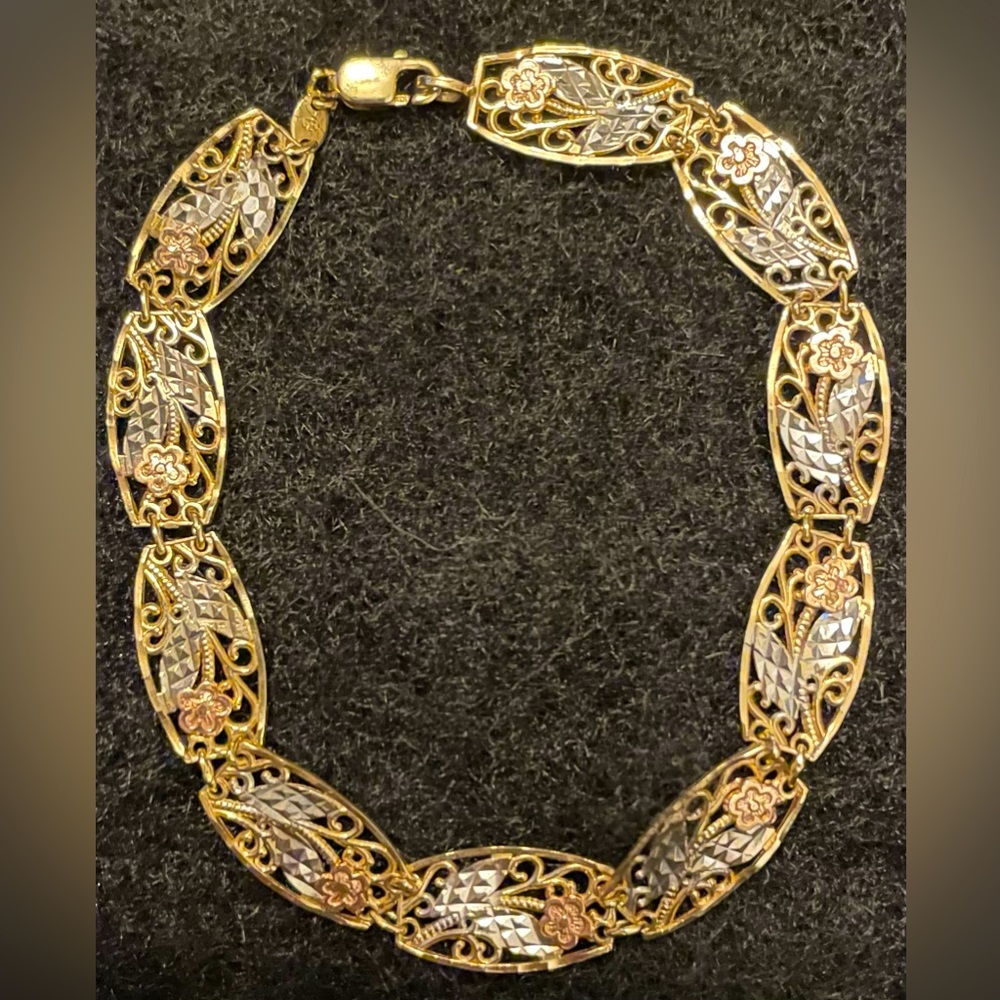 10K Tri-Color Yellow Gold Link Bracelet with Rose Gold Flowers.